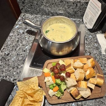 The Melting Pot - Richmond - Spinach Artichoke cheese with dippers - Fondue Near Me - Henrico, Virginia The Melting Pot - Richmond - Spinach Artichoke cheese with dippers - Fondue Near Me - Henrico, Virginia