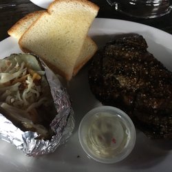 Brewskis Sports Bar and Grill - Thursday $10 ribeye. Salad, steak, baked potato, bread, all for $10! I think it was like $1 more for cheese and sour cream.