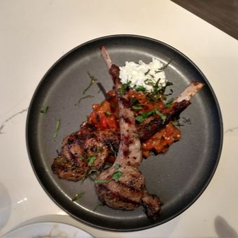 Mezzeterranean - a plate of food on a table - Mediterranean Near Me - Provincetown, Massachusetts