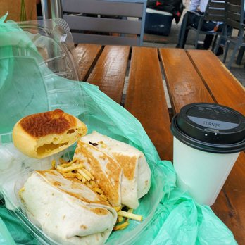 South Beach Munchies - Breakfast wrap with Cafe con leche.. and yes another pan de bolo! - Sandwiches Near Me - Miami Beach, Florida