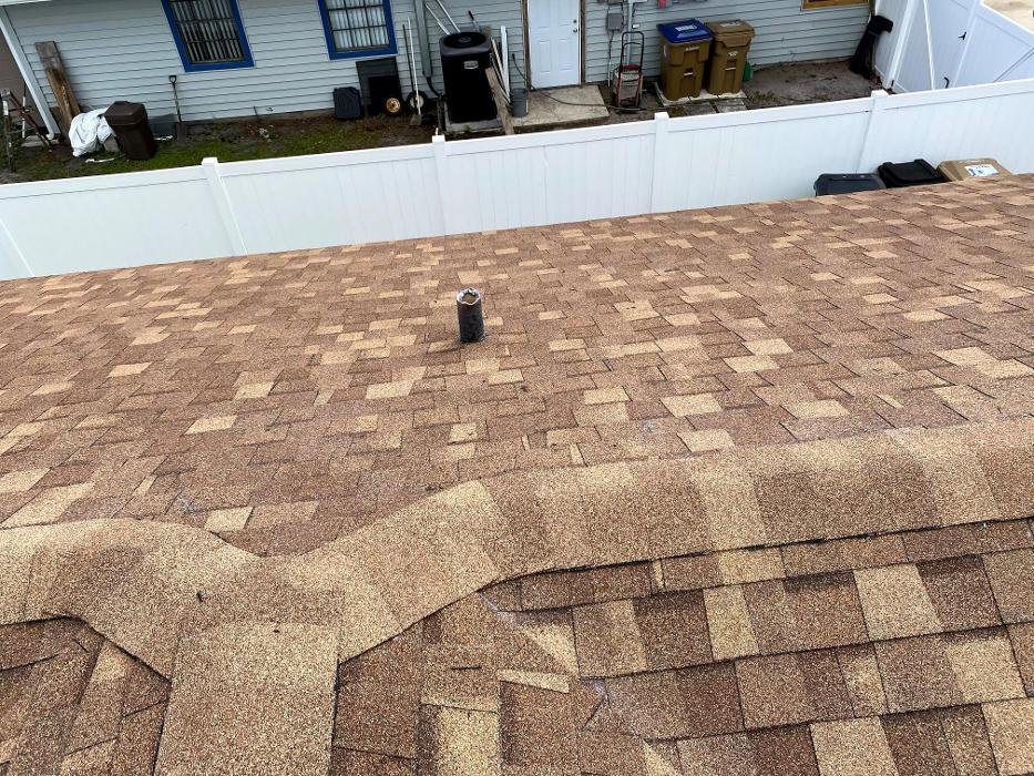 Slide of Mega Roofing