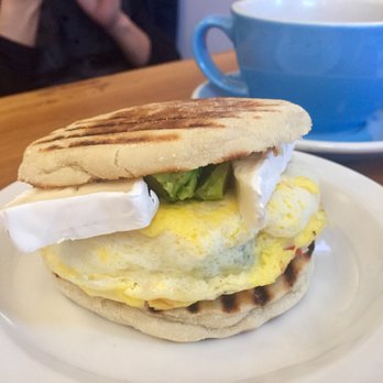 Purple Penguin Cafe - California Breakfast Sandwich- egg, brie, avocado on English muffin - Coffee & Tea Near Me - Toronto, Ontario