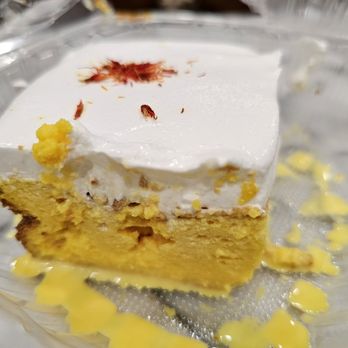 Qamaria Coffee - Saffron milk cake ($8). You can hardly taste the saffron.  There's too much whipped cream on top. 11/17/2024 - Coffee & Tea Near Me - Fullerton, California