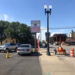 The sign above denotes the small brewery in parking lot The sign above denotes the small brewery in parking lot