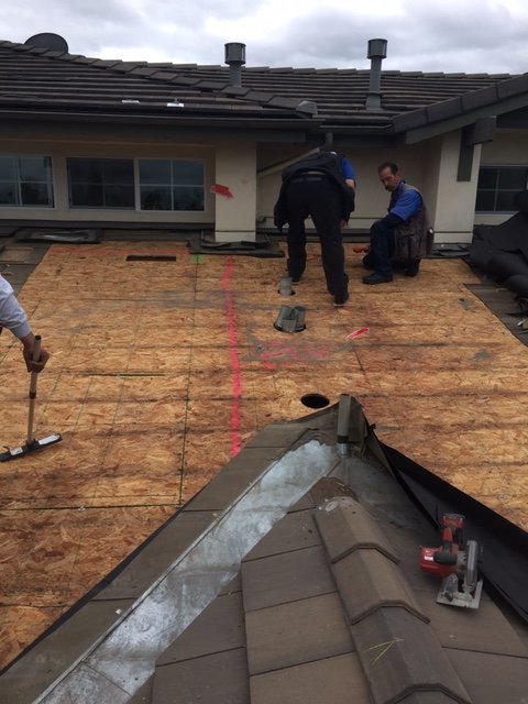 Slide of A-One Roof Management