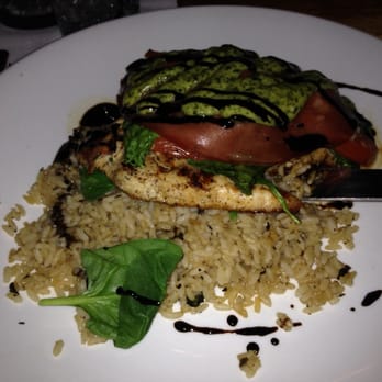 Panico's Bistro - Delicious chicken topped with a sliver of jam and pesto and rice in the side. Melted in your mouth - Pizza Near Me - Cape May, New Jersey