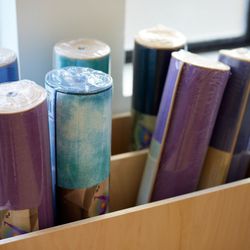 Yoga towels and mats available to rent or buy