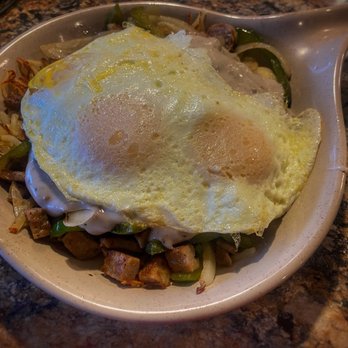 Mamas Kitchen - Southern Skillet - Seasoned Potatoes, Sausage, Onions, Peppers, topped with 3 Eggs & Sausage Gravy - Breakfast & Brunch Near Me - Seminole, Florida