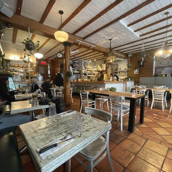Tommy - the inside of a restaurant with tables and chairs - Coffee & Tea Near Me - Montreal, Quebec