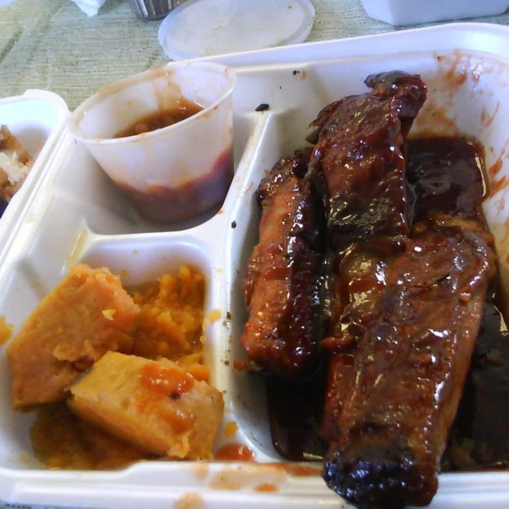 Smokehouse Barbecue - RIbs, yams, baked beans. Oops ate some of this too before taking the photo. There's more food that comes with this. - Barbeque Near Me - Rockford, Illinois Smokehouse Barbecue - RIbs, yams, baked beans. Oops ate some of this too before taking the photo. There's more food that comes with this. - Barbeque Near Me - Rockford, Illinois
