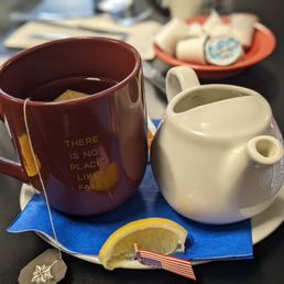 Tea in another unique mug with extra hot water and lemon Tea in another unique mug with extra hot water and lemon