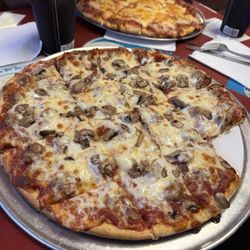 Rocky's Pizza House - Sausage and mushroom delicious