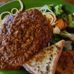 Spaghetti and Meat Sauce. Served with classic Texas toast and steamed veggies Spaghetti and Meat Sauce. Served with classic Texas toast and steamed veggies