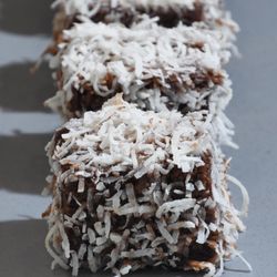 Lamingtons - Vanilla sponge, rolled in chocolate, rolled in coconut