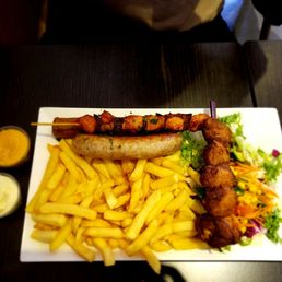 Mix #65- sausage, chicken, salad and fries and #23 wings Mix #65- sausage, chicken, salad and fries and #23 wings