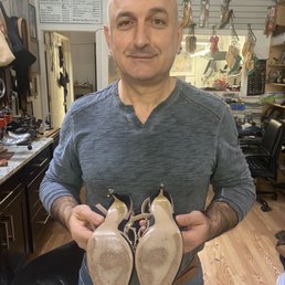 Lovely store owner with my beat up shoes Lovely store owner with my beat up shoes