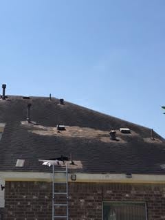 Slide of Coat of Arms Roofing