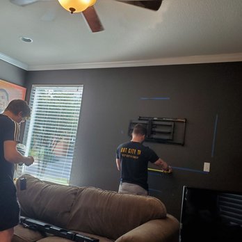 Bat City TV - Adam and Joe measuring to install TV mount and soundbar - Home Theatre Installation Near Me - Austin, Texas