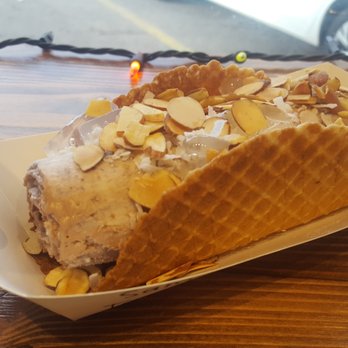 IcyRolls - Nutella taco (with banana and Graham cracker mixed in!) With almonds, coconut flakes, and lychee jellies - Ice Cream & Frozen Yogurt Near Me - San Marcos, Texas IcyRolls - Nutella taco (with banana and Graham cracker mixed in!) With almonds, coconut flakes, and lychee jellies - Ice Cream & Frozen Yogurt Near Me - San Marcos, Texas
