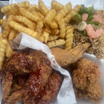Gentilly Wings & Seafood - 10 piece wings , half dragon half regular !!! With fries and rice - Chicken Wings Near Me - New Orleans, Louisiana Gentilly Wings & Seafood - 10 piece wings , half dragon half regular !!! With fries and rice - Chicken Wings Near Me - New Orleans, Louisiana