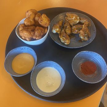 Peri Peri Bistro - Zesty Battered Cauliflower and chicken wings with Bold Garlic Dip - Chicken Shop Near Me - Raleigh, North Carolina Peri Peri Bistro - Zesty Battered Cauliflower and chicken wings with Bold Garlic Dip - Chicken Shop Near Me - Raleigh, North Carolina