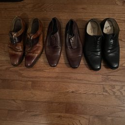 Three pair of dress shoes Three pair of dress shoes
