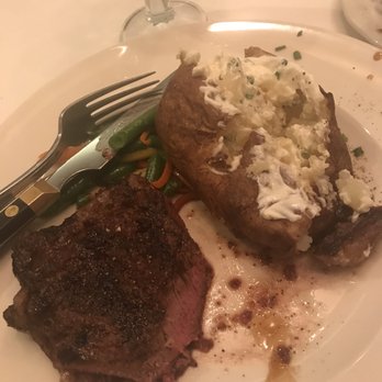 Hy's Steak House - My halved steak so it was quite large and it was nice they gave me my own potato - Steakhouses Near Me - Honolulu, Hawaii