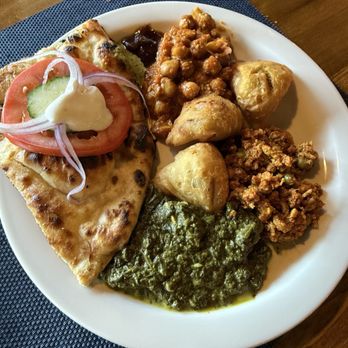 Saffire - A full buffet plate! Paneer with Sage, samosas chickpea curry, ground chicken curry,  and naan! - Indian Near Me - Commack, New York