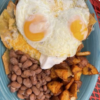 The Pantry Rio - Green chili Chilaquiles con papas e frijoles - New Mexican Cuisine Near Me - Santa Fe, New Mexico The Pantry Rio - Green chili Chilaquiles con papas e frijoles - New Mexican Cuisine Near Me - Santa Fe, New Mexico
