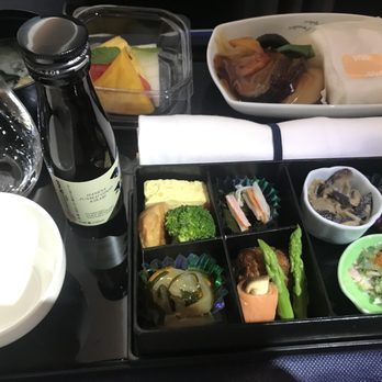 All Nippon Airways - Lunch service:  MNL-HND 5/10/18. Superb.  Love the rice is wrapped in paper to keep warm. - Airlines Near Me - Makati, NCR