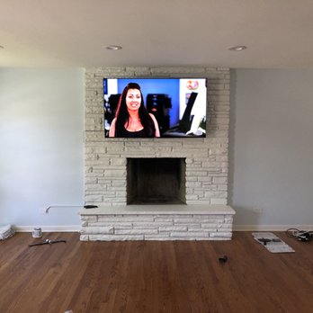 HDInstalls - Fireplace full motion mount - TV Mounting Near Me - Chicago, Illinois HDInstalls - Fireplace full motion mount - TV Mounting Near Me - Chicago, Illinois