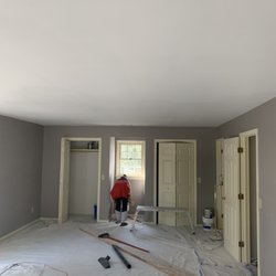 Carolinas Finest Construction Company - Popcorn ceiling removal, drywall finishing then we primed and painted the smooth new ceilings