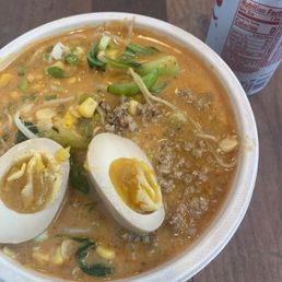 Red curry ramen with egg and diet coke. Red curry ramen with egg and diet coke.