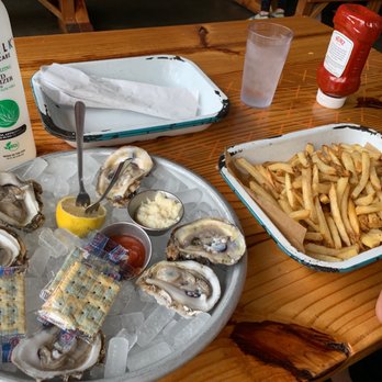 TLC Austin - $1 oysters and $7 fries available during happy hour 3-5:30pm - American Near Me - Austin, Texas