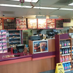 Dunkin' - Inside dinning w/ donuts and coffee