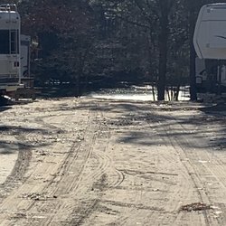 Pine Lake RV Resort & Campground - Sandy road to pond.