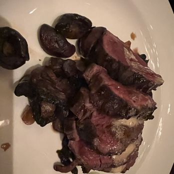 The Capital Grille - Sliced Filet Mignon with Cipollini Onions, Wild Mushrooms and Fig Essence - Steakhouses Near Me - Austin, Texas