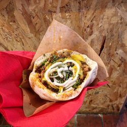 Soumsoum - This is the Pita Sandwich with some Veal and legumes.