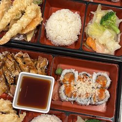 Komachi - Chicken teriyaki & pork cutlet dinner bento boxes, with spicy crab and spicy salmon substitute.