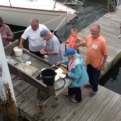 Miramar Yacht Club - Snapper derby, cleaning all those fish.