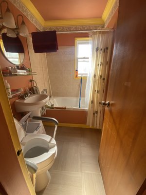 Tub to Curb Less Shower Conversion - This was a bath tub to a curb-less shower conversion in a 5 ft x 8 foot bathroom in a pre 1960 house