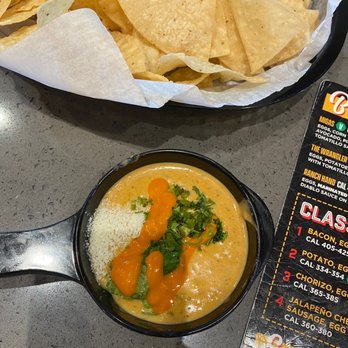 Torchy's Tacos - Half size Queso - Tacos Near Me - Columbus, Ohio Torchy's Tacos - Half size Queso - Tacos Near Me - Columbus, Ohio