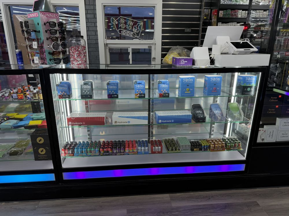 One Quick Stop Mini Mart Logo