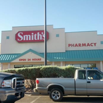 Smith's - two trucks parked in front of a pharmacy - Grocery Near Me - Mesquite, Nevada