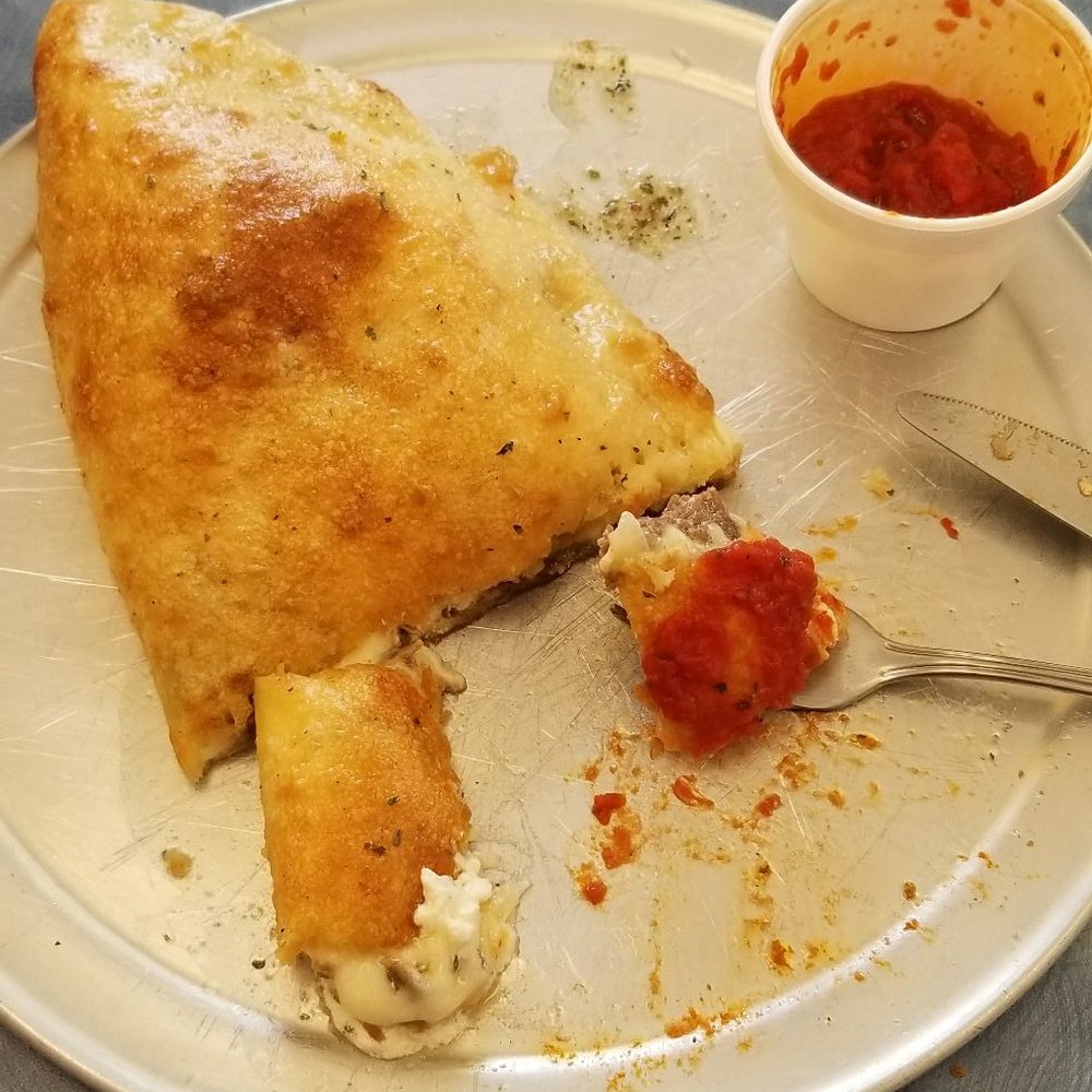 Pizza Bella - I couldn't finish it lol guess I'll be eating calzone for dinner - Pizza Near Me - Jacksonville, Florida Pizza Bella - I couldn't finish it lol guess I'll be eating calzone for dinner - Pizza Near Me - Jacksonville, Florida