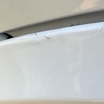 United Collision Specialists - Side panel over tire that was not sanded. Painted or attached properly. - Body Shops Near Me - Los Angeles, California United Collision Specialists - Side panel over tire that was not sanded. Painted or attached properly. - Body Shops Near Me - Los Angeles, California