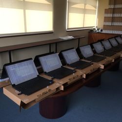 B&C IT Solutions - Configuring multiple laptops for a business. These are new laptops that we are installing all the software they will be using.