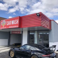 Popular Car Wash & Detailing - Free Vacuums - Exterior of car wash