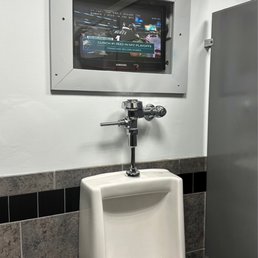 Should be mandatory at any sports bar - TV whilst you relieve yourself...