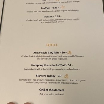Bati Bassac - a hand holding a menu - Thai Near Me - Quebec City, Quebec Bati Bassac - a hand holding a menu - Thai Near Me - Quebec City, Quebec